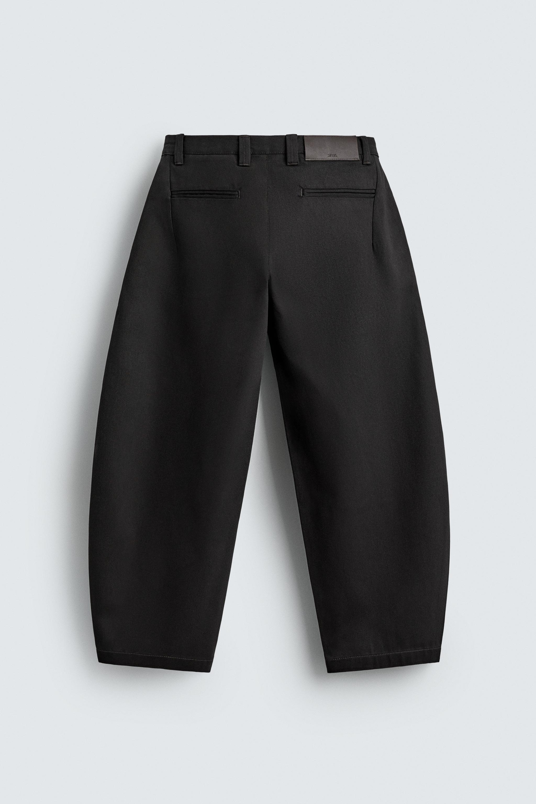 PLEATED BALLOON FIT JEANS